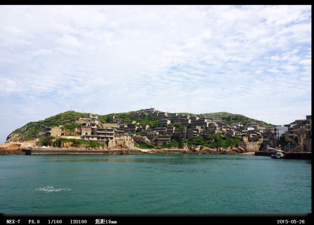 这里便是坐船远望气势壮观的"海上布达拉宫.